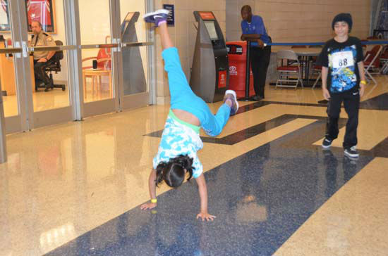 Two young dancers are lined up to audition for...